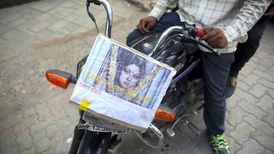 Sridevi's portrait respectfully put by Dilip Chauhan and Sohan Hatkar on their Bike. Subhash Sharma for The National