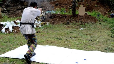 As part of the livelihood programme, men are trained in crime prevention, negotiation skills, emergency response as well as how to shoot. Aya Lowe for The National