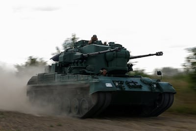 Ukrainian servicemen operate a Gepard self-propelled anti-aircraft gun during their combat shift, amid Russia's attack on Ukraine, in Zhytomyr region, Ukraine September 5, 2023. REUTERS / Valentyn Ogirenko