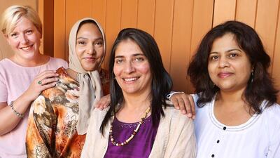 Autism assistant behaviour analyst Nina Bhuptani, in purple, with from left, Janine Thompson, Razzan Galiel, and Kalyani Saha. Delores Johnson / The National