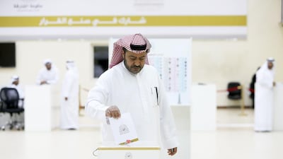 Voters cast their ballots on the last day of Sharjah Consultative Council elections. Pawan Singh / The National