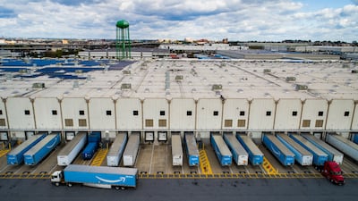 Lorries parked outside an Amazon fulfilment centre in Baltimore, Maryland, US, in 2021. EPA