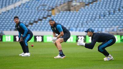 England captain Joe Root takes a catch during training. Getty