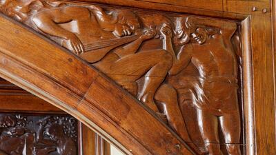 A stained-glass window featuring illustrations of The Brownies children’s book is now at the Victoria & Albert Museum, although some of the figures are depicted in the wooden panels retained over the reception hall. Courtesy Cheffins