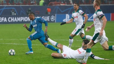 Douglas Costa finishes his incredible run to score the winner for Juve. AP