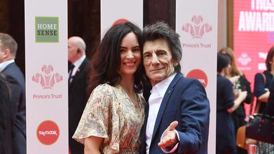 Musician Ronnie Wood and Sally Humphreys arrive at The Prince's Trust Awards held at the London Palladium on March 11, 2020. EPA