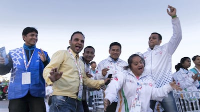 Special Olympics Indian team dancing at the host town closing ceremony in Global Village. Reem Mohammed / The National