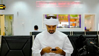 After checking in, Thamer waits in departures at Abu Dhabi's Al Bateen Airport.