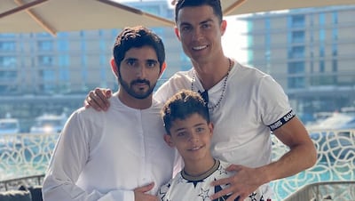 Cristiano Ronaldo and his son, Cristiano Jr, alongside Sheikh Hamdan bin Mohammed, Crown Prince of Dubai, during the Portugal star's family Christmas break in Dubai in 2021. Instagram/Cristiano Ronaldo