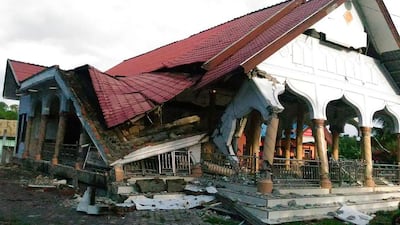 A badly damaged building is seen after the 6.5-magnitude earthquake. AFP