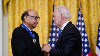 Mr Biden awards the medal to Pakistani-American Khizr Khan, whose son US Army Capt Humayun Khan died in Iraq in 2004, in the East Room of the White House in Washington. AP