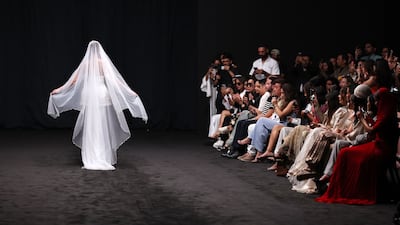 A Rizman Ruzaini fashion show, a highlight of the first day of this year's Dubai Fashion Week. Chris Whiteoak / The National