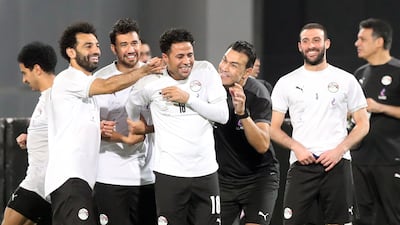 Egypt national team players, including Mohamed Salah, left, in during a training session at the Cairo International Stadium on the eve of the Africa Cup of Nations qualification match against Guinea. All photos: EPA