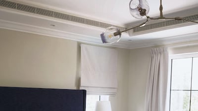 Inside the master bedroom, the focal point is an imposing, midnight-blue, king-sized bed from online furniture retailer, helmii. Anna Nielsen / The National