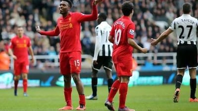 Daniel Sturridge, left, scored two of Liverpool's six goals in their win at Newcastle United.