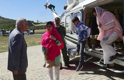 Ms Yousafzai was guarded by the Pakistani military during her visit. Abdul Majeed/ AFP Photo