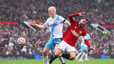 Will Hughes of Crystal Palace challenges for the ball with Bruno Fernandes of Manchester United during their match at Old Trafford on Saturday, September 30, 2023. Getty