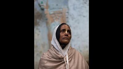 Mira Dasi, 62. Dasi has lived in the ashram for eight years and says, 'A person who is good can find every place good. God keeps me always happy. I can only live here in Vrindavan, not anywhere else, not even in my town in Bengal because Vrindavan is where I find God.'