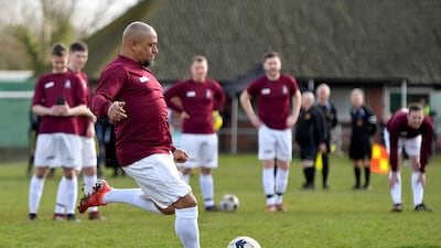 Roberto Carlos scores a penalty for Bull in the Barne United after turning out for the team, which won the eBay Dream Transfer raffle in aid of youth charity, Football Beyond Borders. PA