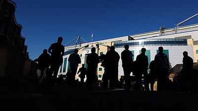 Chelsea fans gather outside their Stamford Bridge ground, which is the subject of the club trying to buy the freehold from a fans group. Paul Gilham / Getty Images