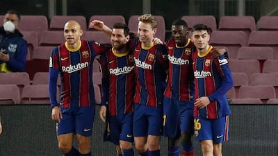 Barcelona's Lionel Messi celebrates scoring their second goal. Reuters