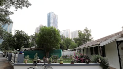 View of the front garden of one of the villa in the Desert Springs Village in Tecom area in Dubai. Pawan Singh / The National