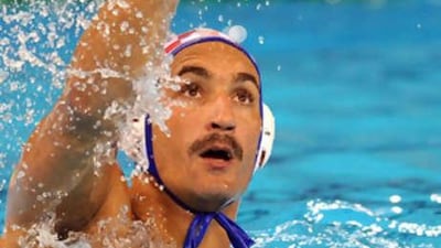 Samir Barac of Croatia gets a pass away against Italy during their men's water polo match.
