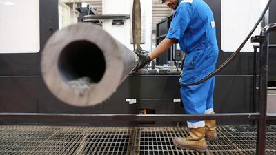 A worker at the Weir Group plant which deals in oilfield products at Jebel Ali Industrial Area in Dubai. Pawan Singh / The National