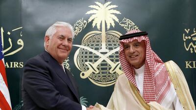 The Us secretary of state Rex Tillerson and Saudi foreign minister Adel Al Jubeir shake hands at a press conference in Riyadh on October 22, 2017. Alex Brandon / AFP