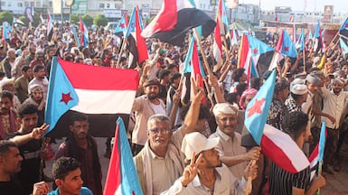 Yemeni supporters of the STC gather in the port city of Aden earlier this week to wave the old South Yemen flag at a rally to demand a 'second independence'. AFP