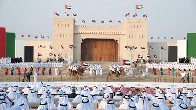 Audience members watch the Union March during the Sheikh Zayed Heritage Festival. Mohamed Al Suwaidi for the Crown Prince Court - Abu Dhabi