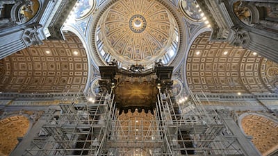 Scaffolding is mounted around the baldachin of St. Peter's basilica to start its restoration in the Vatican. AFP