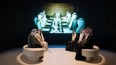President Sheikh Mohamed and other UAE leaders sit in front of a photograph of the first Federal Supreme Council meeting, during a tour of the Zayed National Museum in Abu Dhabi. UAE Presidential Court