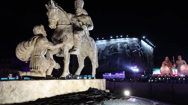 A statue depicting Sasanian king Shapur I capturing Roman emperor Valerian is unveiled at the Revolution Square in Tehran. The event was the latest in a series of unveiling of national symbols following Iran's 12-day war with Israel in June. AFP