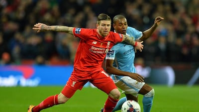 Liverpool’s Spanish defender Alberto Moreno (L) vies with Manchester City’s Brazilian midfielder Fernando (R) during the English League Cup final football match between Liverpool and Manchester City at Wembley Stadium in London on February 28, 2016. AFP / GLYN KIRK