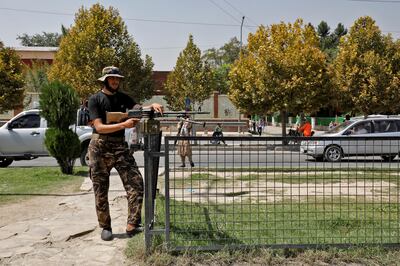 A Taliban fighter stands guard after a blast in front of the Russian embassy in Kabul, Afghanistan, September 5, 2022. Reuters