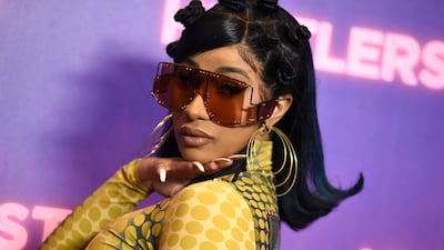 Cardi B arrives at a photo call for Hustlers in Beverly Hills, California. Invision / AP