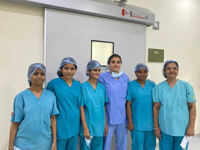 Dr Poovamma with the blind Medical Tactile Examiners who work with the Cytecare Hospital in Bengaluru in India's southern state of Karnataka. The MTEs have been trained to screen lumps, cysts, or any other abnormality in women and help raise awareness about breast cancer.