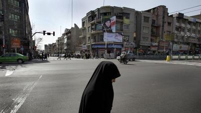 Enqelab “Revolution” Street in Tehran. Iran’s capital is the setting for Hooman Majd’s The Ministry of Guidance Invites You to Not Stay, the story of Majd’s return to his birthplace. Kamran Jebreili / AP Photo