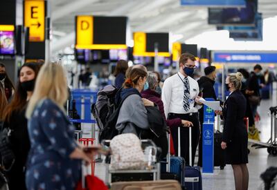 Passengers queue in the departures area of Heathrow Airport after the travel ban was lifted. Reuters