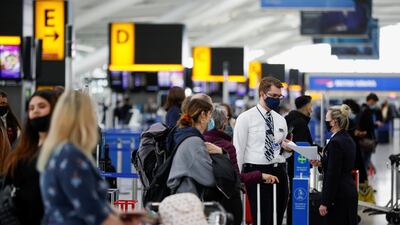 Passengers queue in the departures area of Heathrow Airport after the travel ban was lifted. Reuters