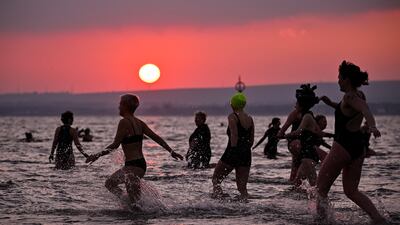 Tuesday morning saw several hundred swimmers take a dawn dip in the North Sea for the International Women’s Day Swimrise event, at Portobello Beach, in Scotland's capital Edinburgh. Getty Images
