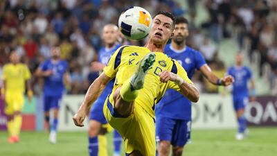 Al Nassr's Cristiano Ronaldo tries to control the ball. Chris Whiteoak / The National