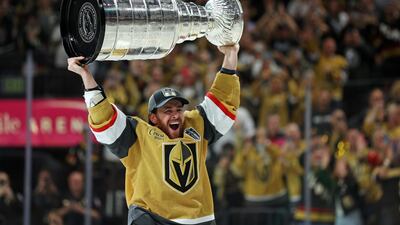Reilly Smith of the Vegas Golden Knights hoists the Stanley Cup after a win against the Florida Panthers in Game Five of the 2023 NHL Stanley Cup Final at T-Mobile Arena. AFP