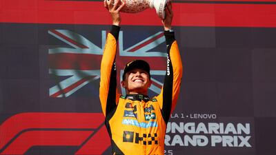 McLaren's Lando Norris celebrates after winning the Hungarian Grand Prix at the Hungaroring on August 3, 2025. Getty Images