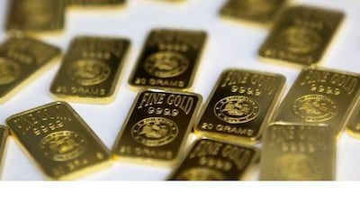 Freshly minted 20-gram gold bars in Dubai. Pawel Dwulit / The National