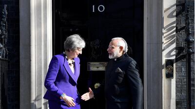 British Prime Minster Theresa May welcoming Indian Prime Minister Narendra Modi before their meeting at 10 Downing Street in London last year. Andy Rain / EPA