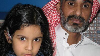 Mansour Al Timani, with his daughter, Nuha, five, and his wife were forcibly divorced after the wife's brothers complained of 'tribal incompatibility'.