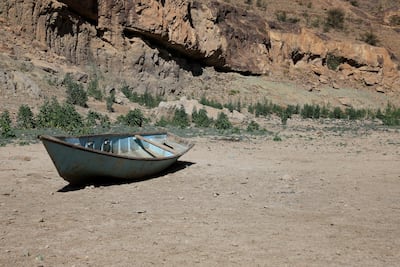 An abandoned boat lies in a dried-up reservoir on the outskirts of Sanaa, Yemen. EPA