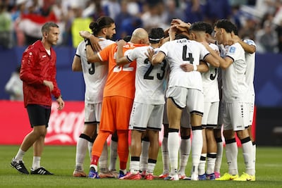 Iraq players huddle during the match against France in Philadelphia, Pennsylvania. EPA